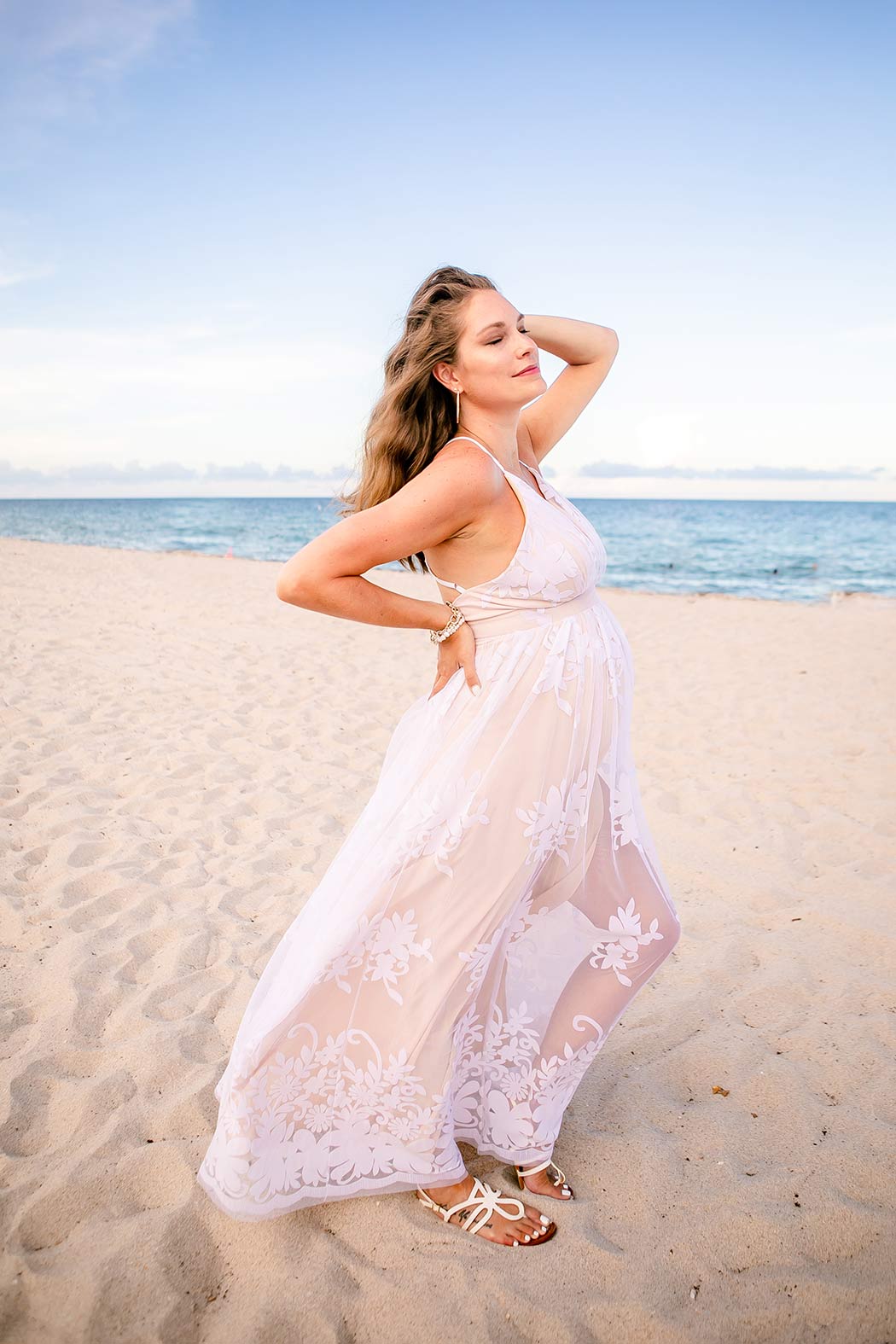 stunning pose for maternity photography on fort lauderdale beach