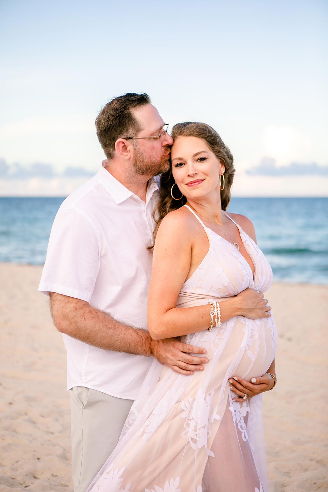 unique maternity pose on the beach | beautiful beach maternity photos in fort lauderdale | maternity photographer fort lauderdale