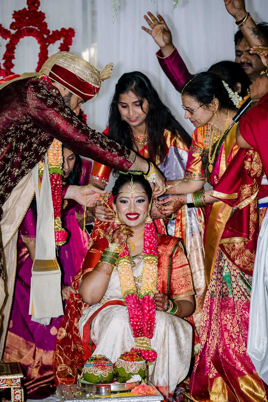 traditional Hindu wedding photography | groom tying ceremony during Hindu wedding in Fort Lauderdale