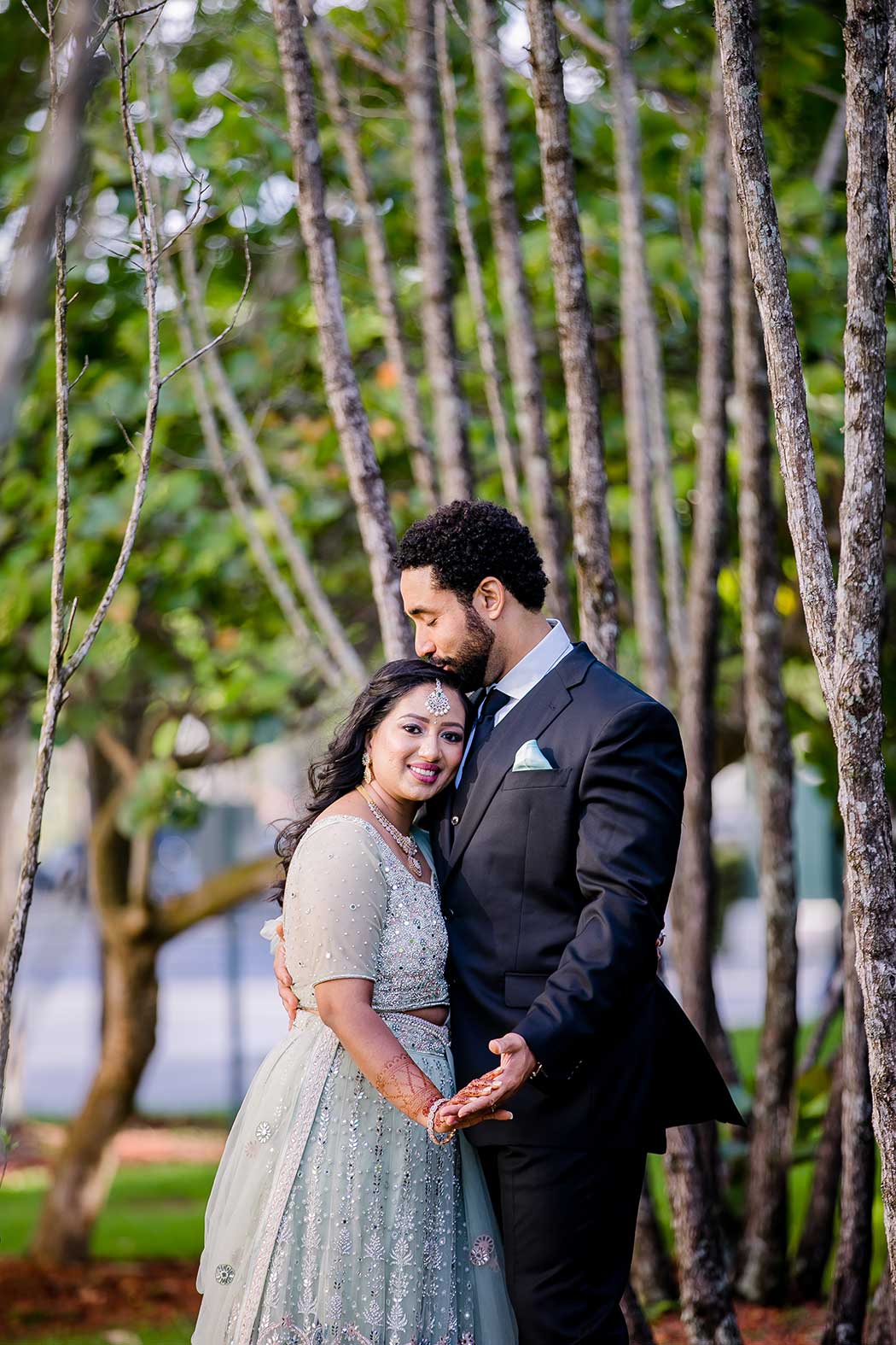 bride and groom smiling for wedding pictures in fort lauderdale 