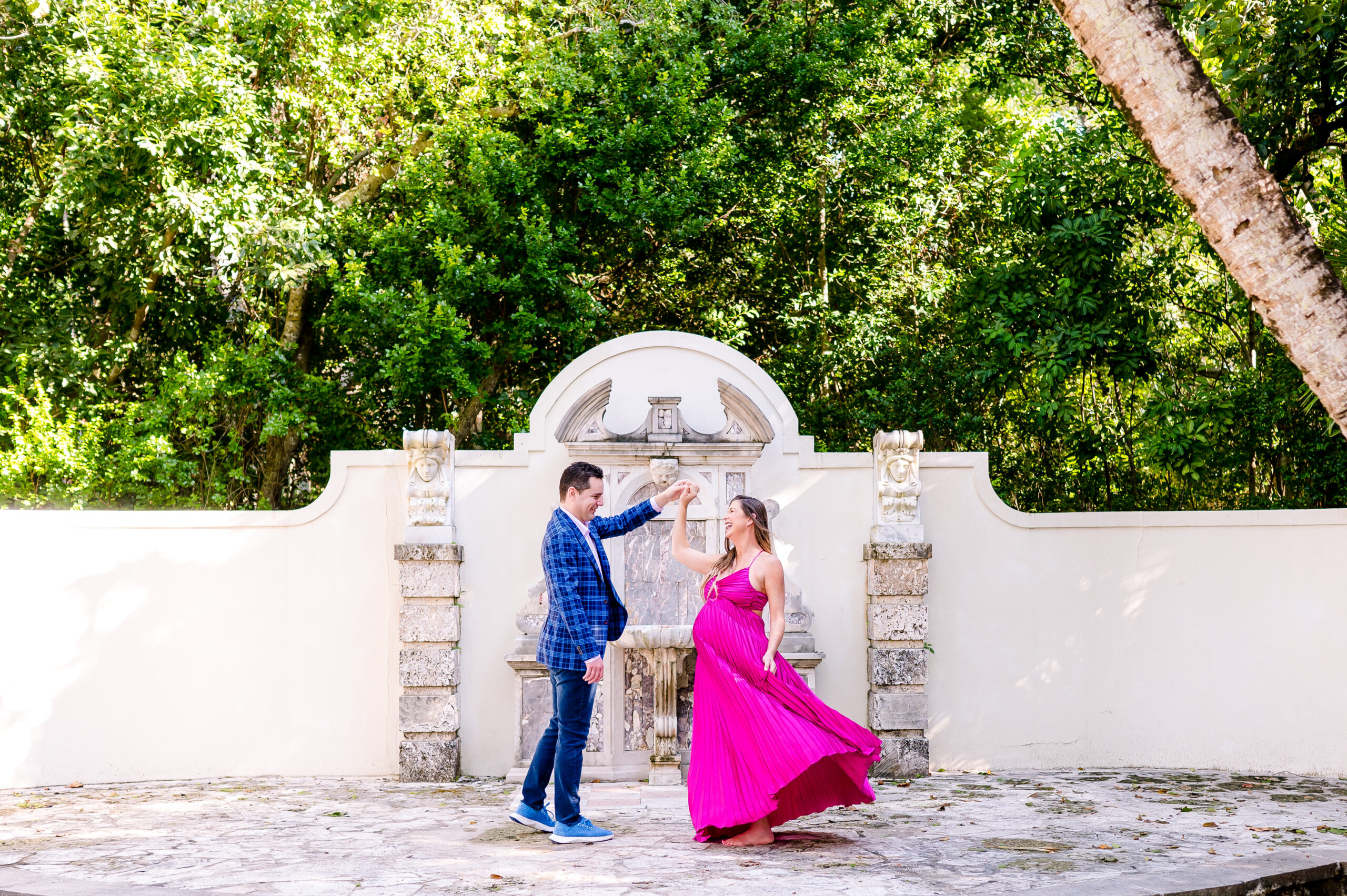 couple hold hands during an engagement beach photography session | fort lauderdale engagement photographer