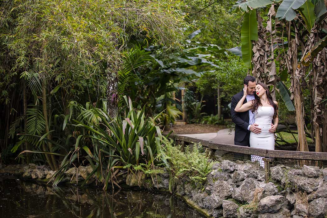 Engagement photo session with beautiful couple in the lush gardens of Flamingo Gardens, Davie