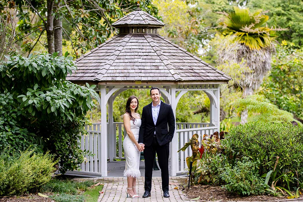 Couple pose for photographs at the gazebo in flamingo gardens, Davie, South Florida