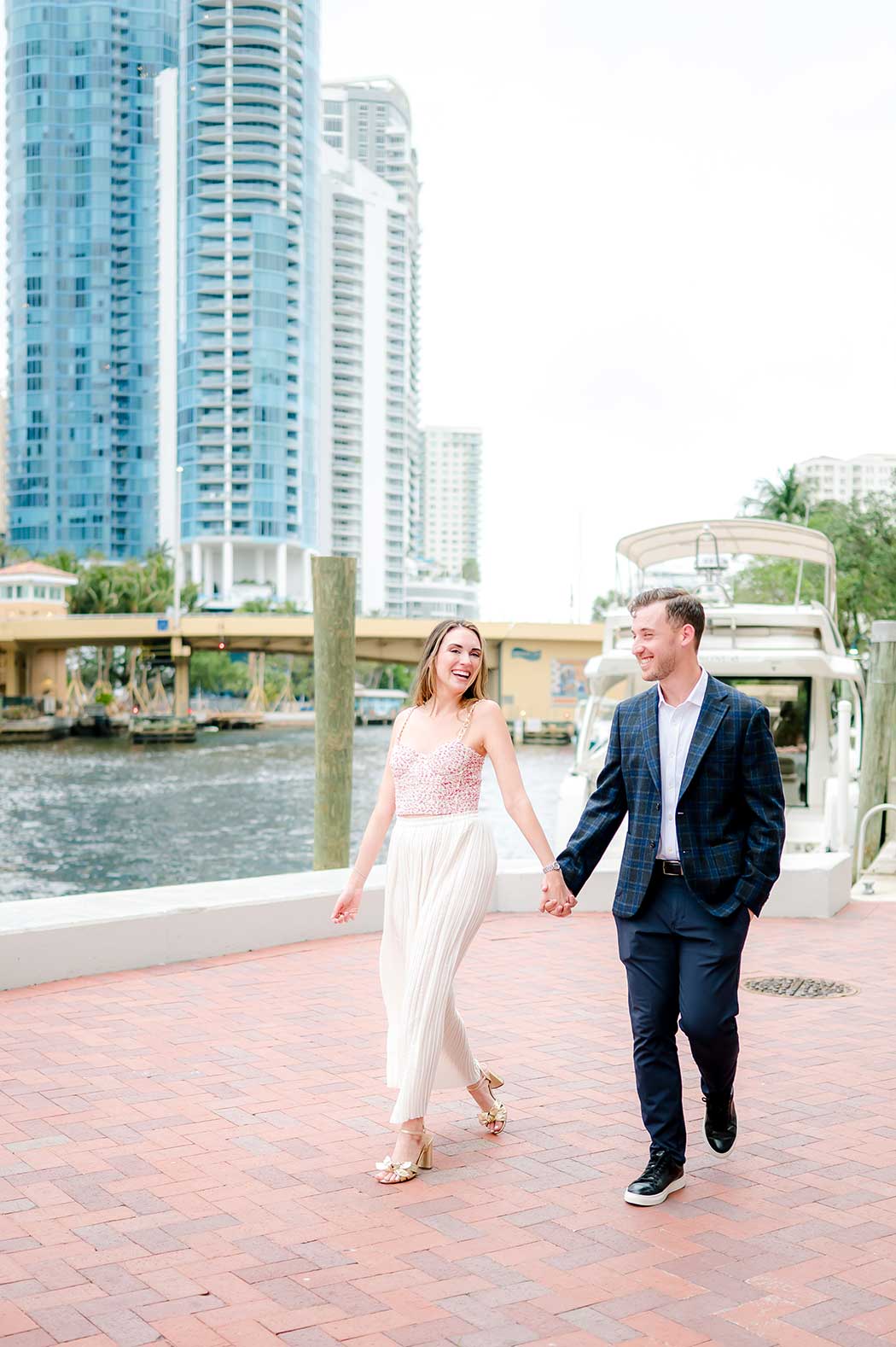 She Said Yes at the Riverwalk Newly engaged couple reacting to surprise photoshoot at Fort Lauderdale Riverwalk