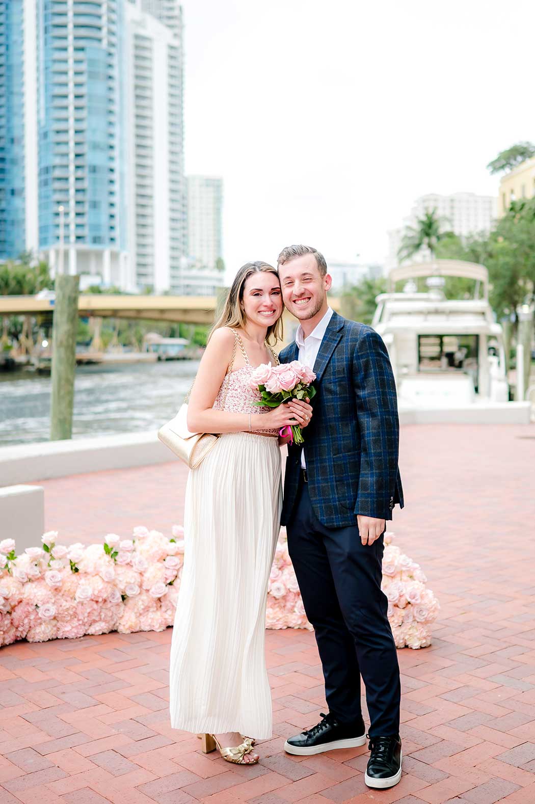 Captured moments after a surprise proposal in Fort Lauderdale Man surprising woman with a photoshoot along the Fort Lauderdale Riverwalk
