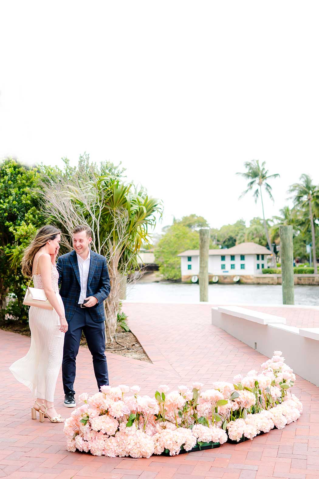 Fort Lauderdale Riverwalk Surprise Proposal Surprise photography photoshoot taking place at the Fort Lauderdale Riverwalk