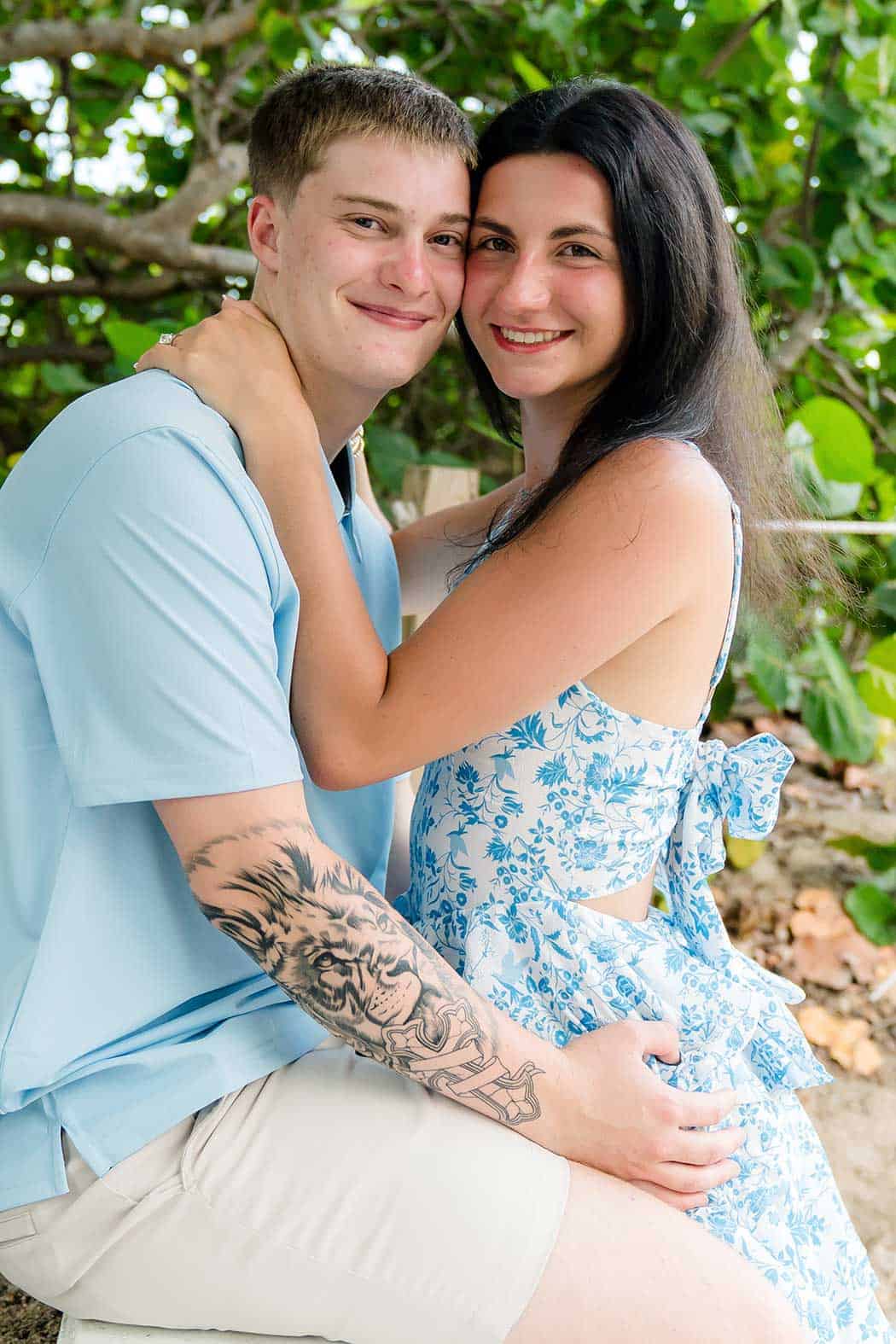Couple celebrating after a romantic proposal on Fort Lauderdale Beach