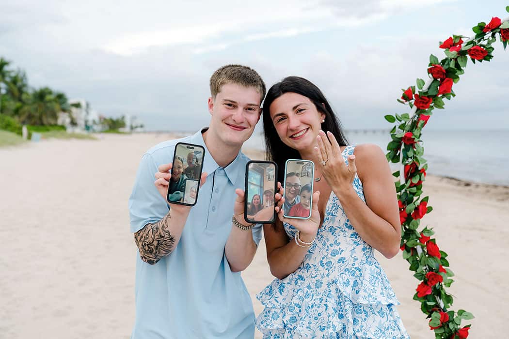 Newly engaged couple celebrating their Fort Lauderdale Beach proposal with friends on a video call